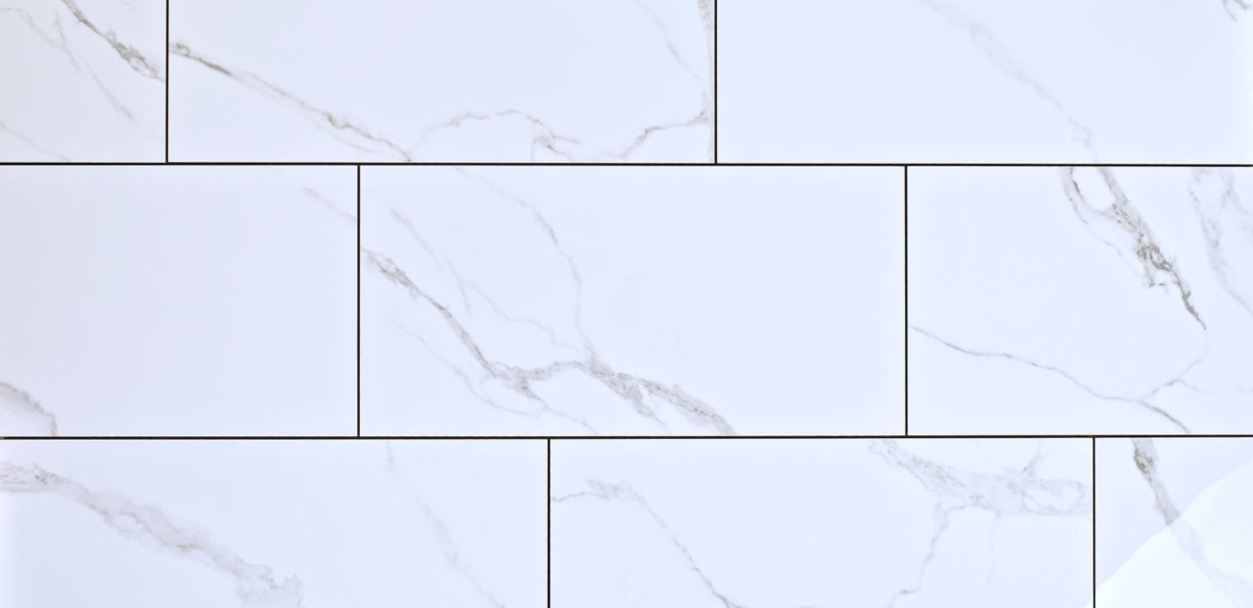 White carrara porcelain rectangular floor and wall tile with glossy finish, size 12" x 24"
