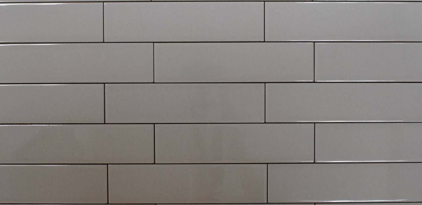Glossy dark beige rectangular ceramic subway wall tile, size 3" x 12", stacked like bricks