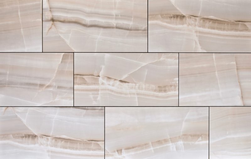 Matte caramel color rectangular porcelain floor tile, size 13" x 26", stacked like bricks